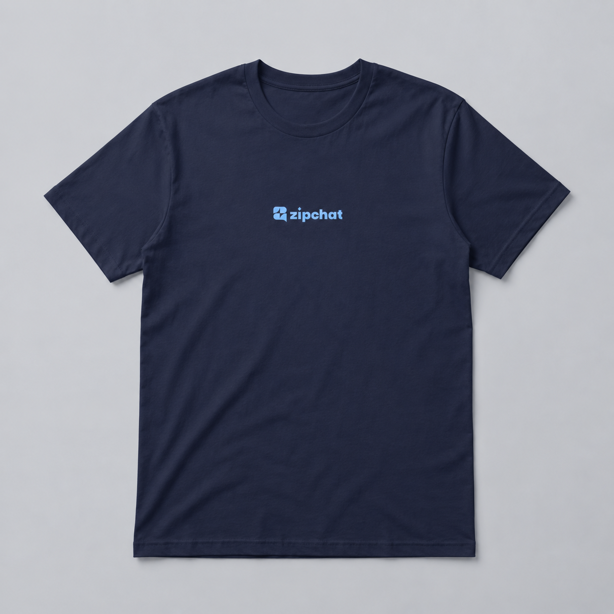The Billboard blu is a soft cotton, plain navy blue t-shirt with a small light blue zipchat logo and icon centered on the chest, shown against a light gray background.